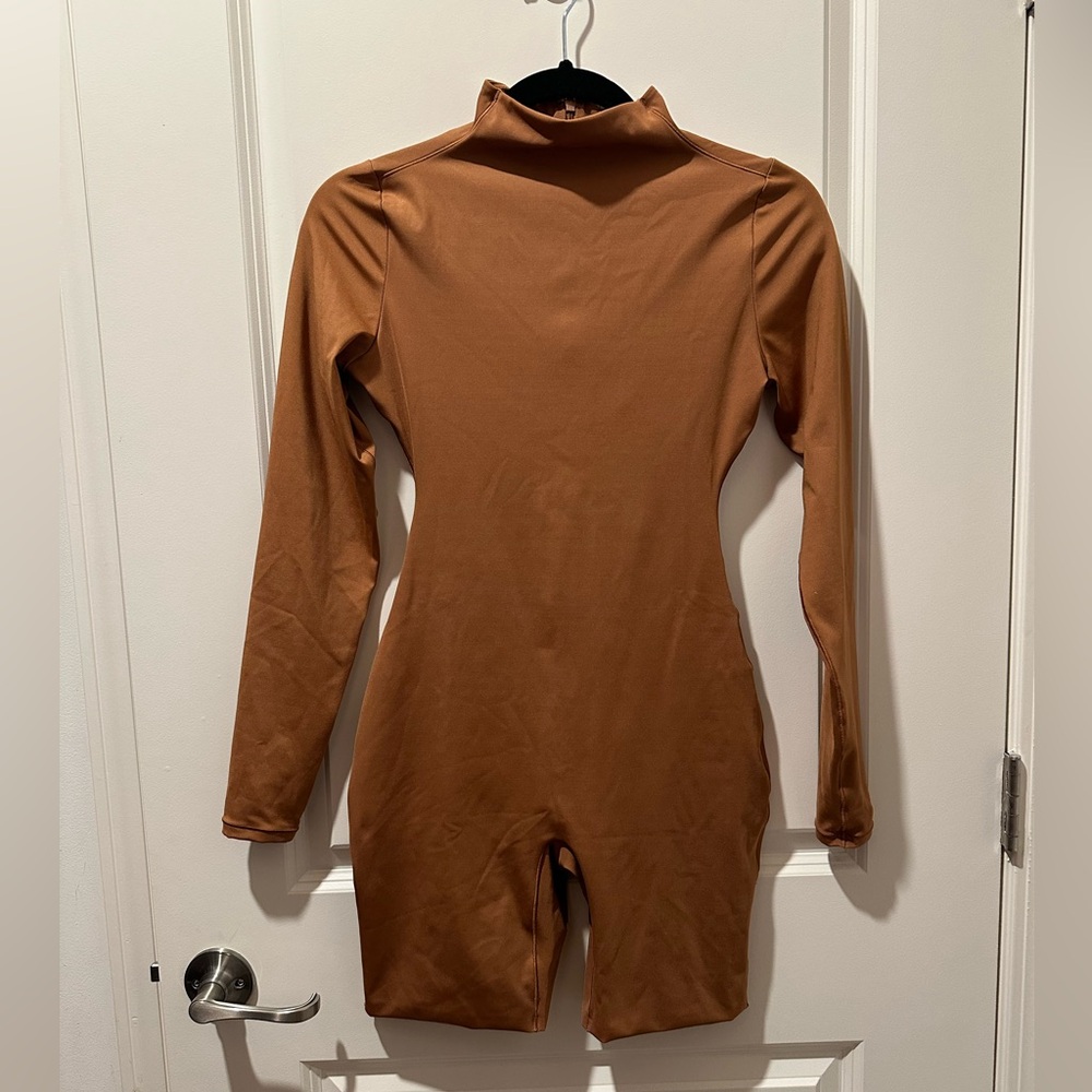 Skims all in one long sleeves onesie